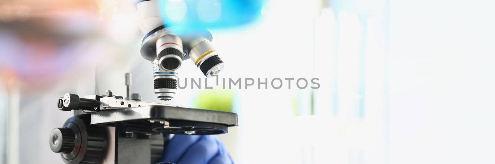 Microscope in laboratory for study of biology and chemistry by kuprevich