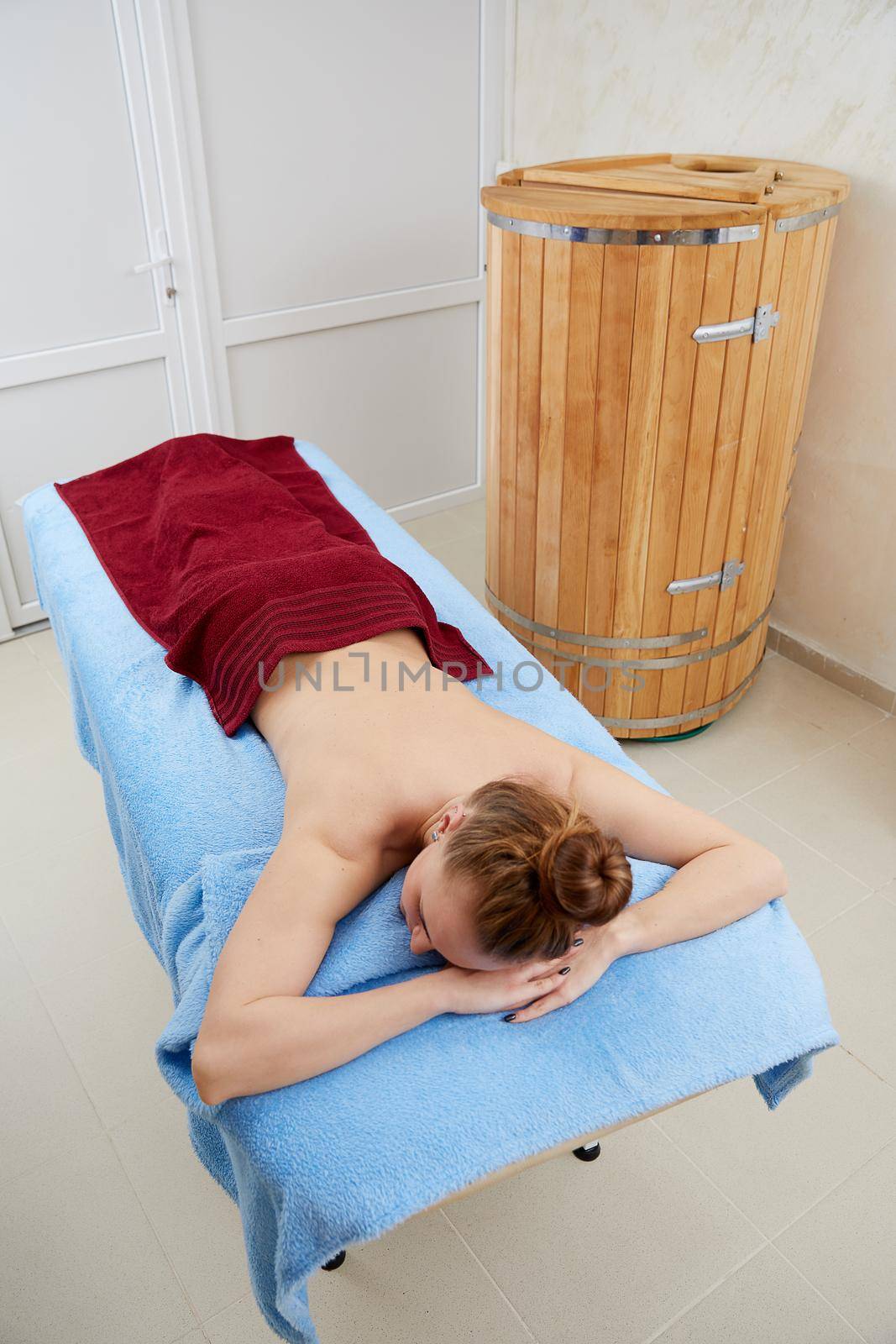 Girl relaxes in a spa salon before massage by Mariakray