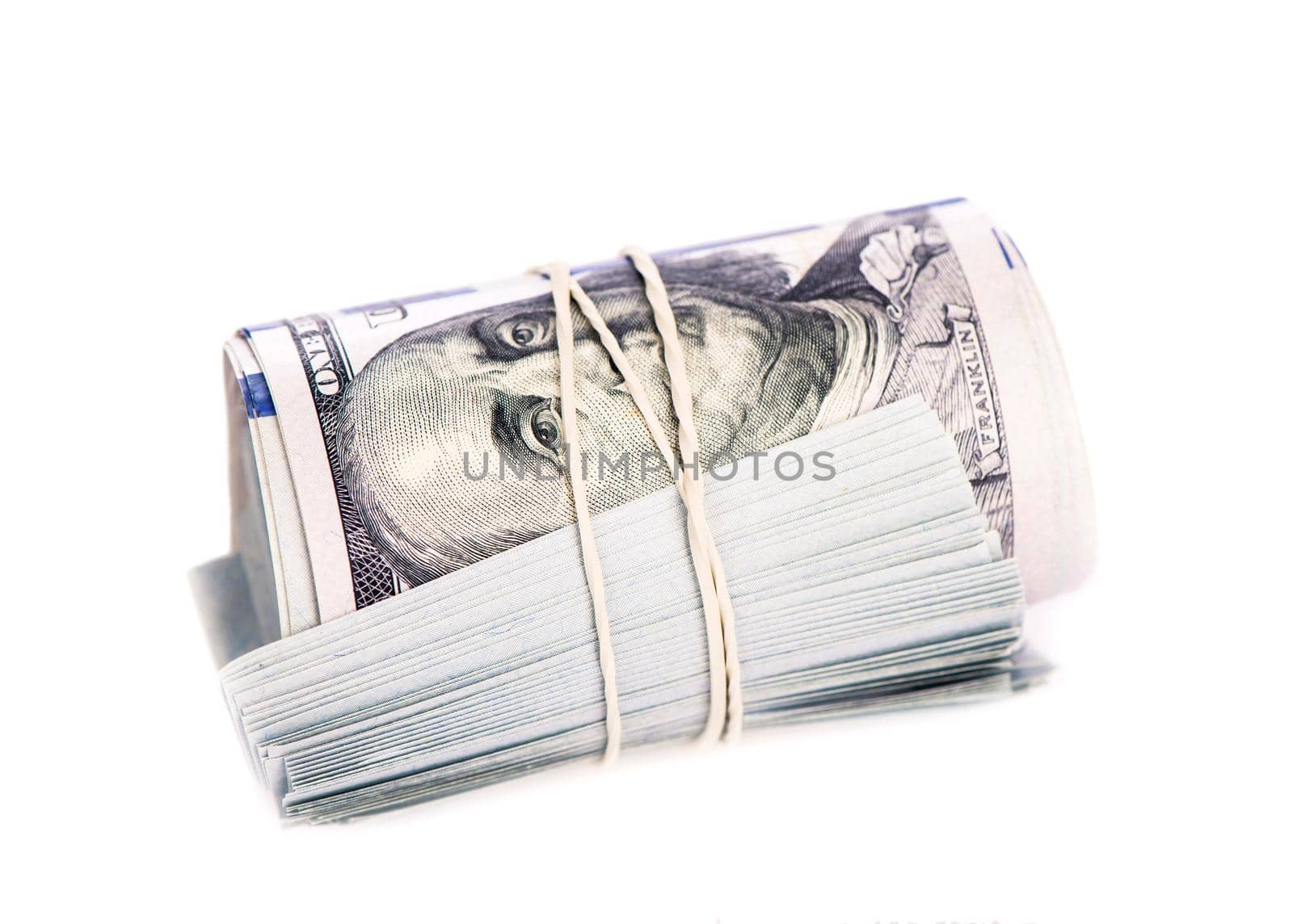 rolled american dollar banknotes isolated on white background. by aprilphoto