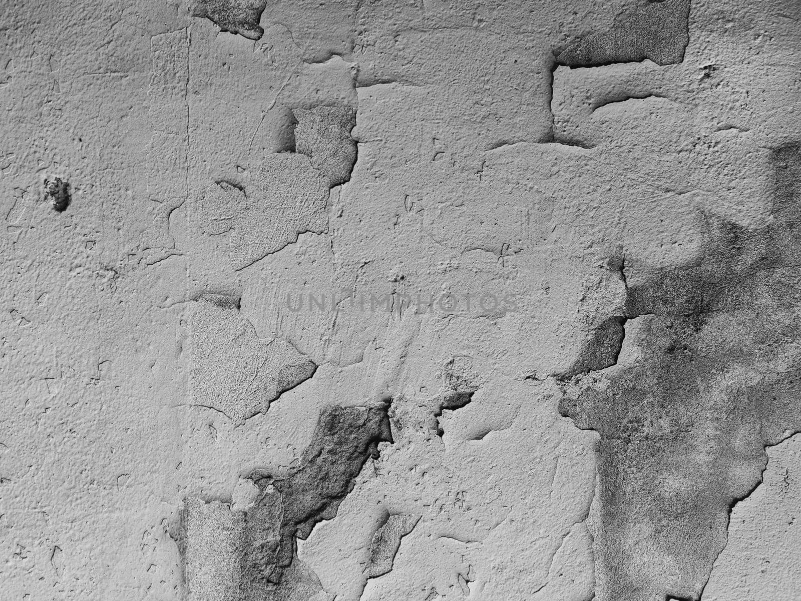 Abstract Background of damaged plaster on concrete wall. by gelog67