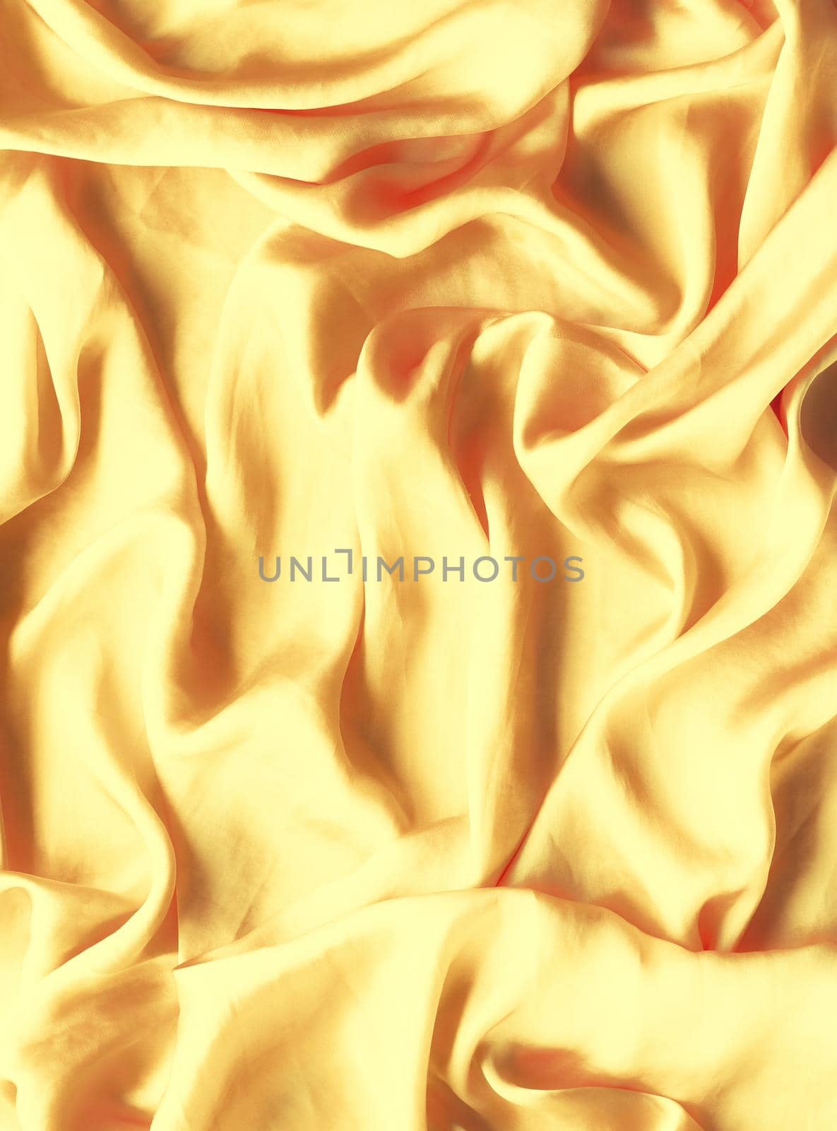 Luxury golden silk background texture - elegant fabric textures, abstract backgrounds and modern pastel colours concept