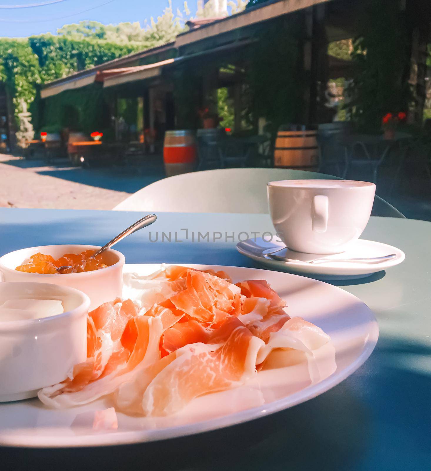 Breakfast outdoors in summer, ham, jam, butter and ham by Anneleven