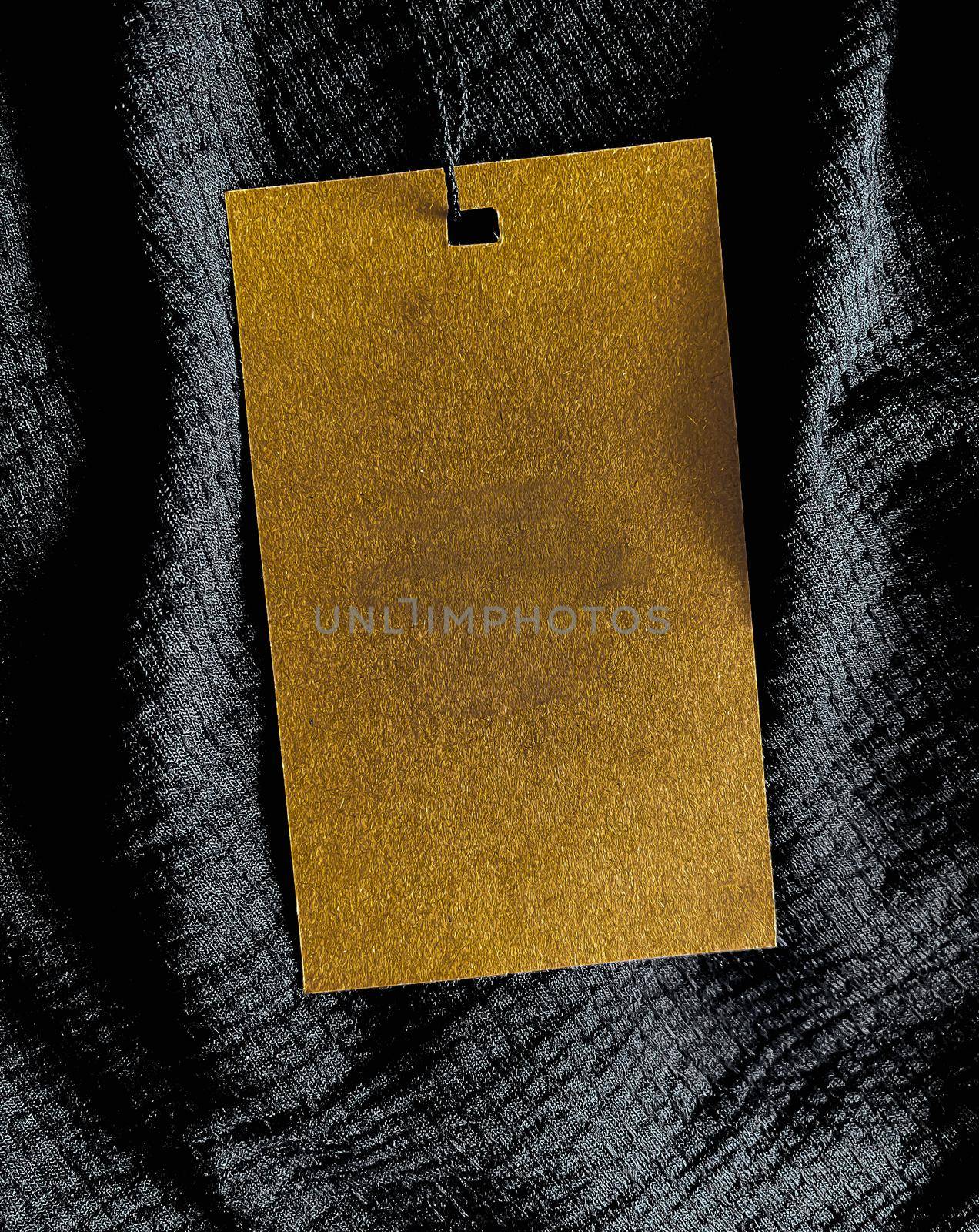 Blank fashion label tag, sale price card on luxury fabric background, shopping and retail by Anneleven