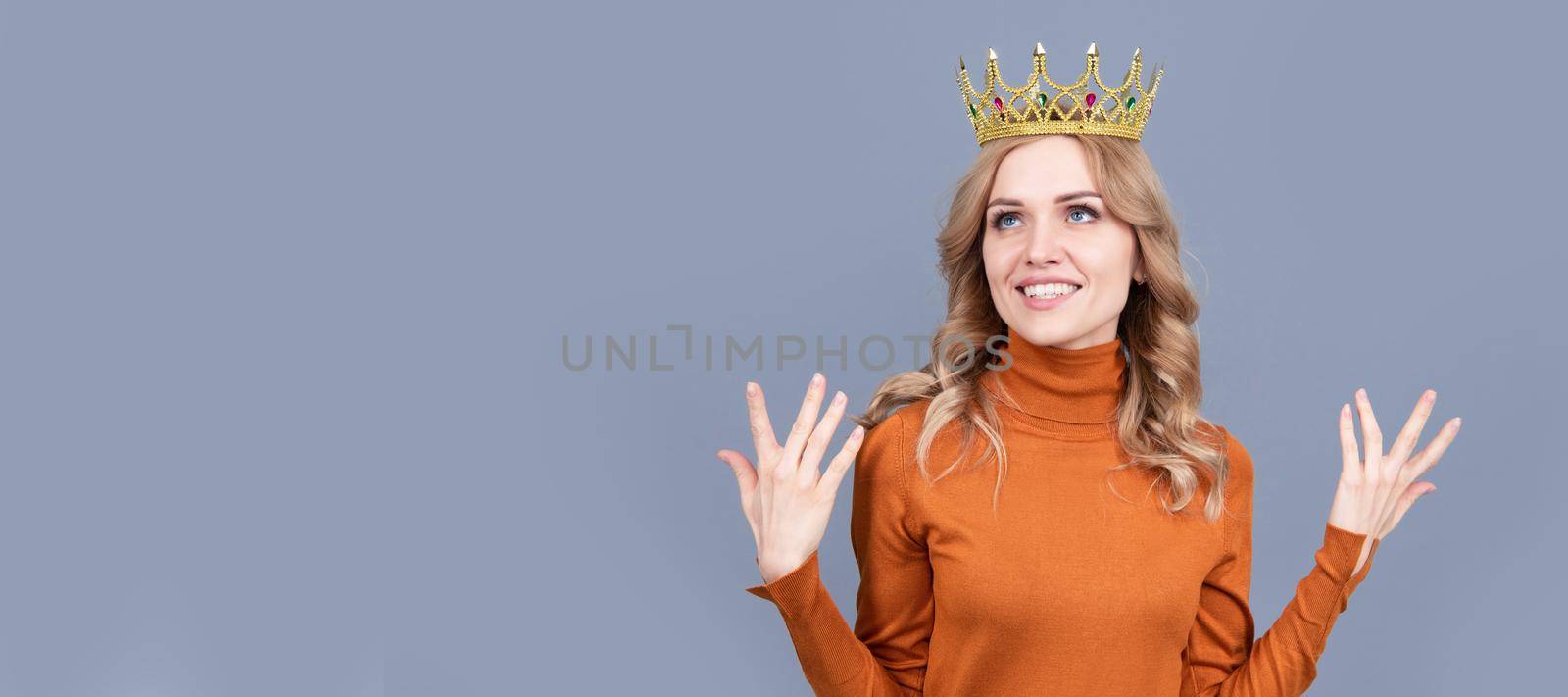 Princess woman with crown. happy blonde woman with curly hair wear crown, narcissism. Woman portrait, isolated header banner with copy space