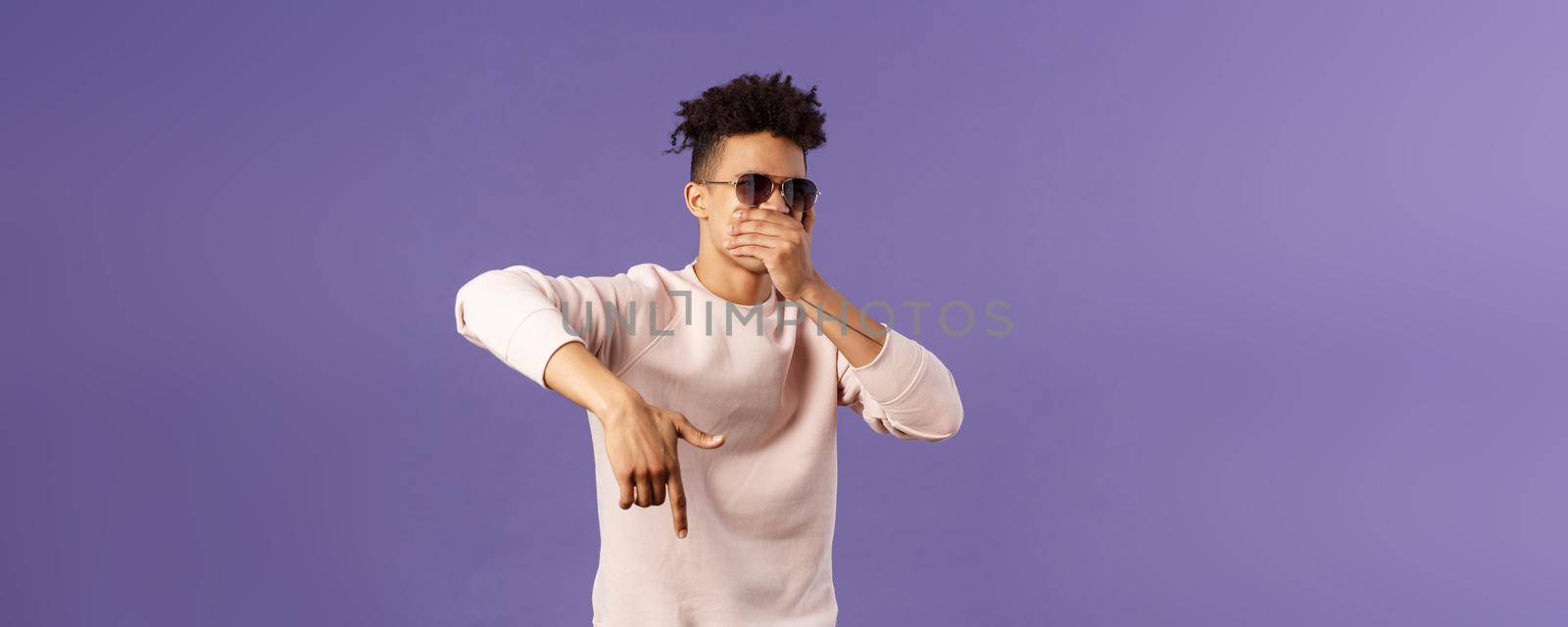 Waist-up portrait of cool young handsome guy with dreads, sunglasses on, hold hand over mouth while beatboxing, waving hand to shake audience up, reading own rap, purple background by Benzoix