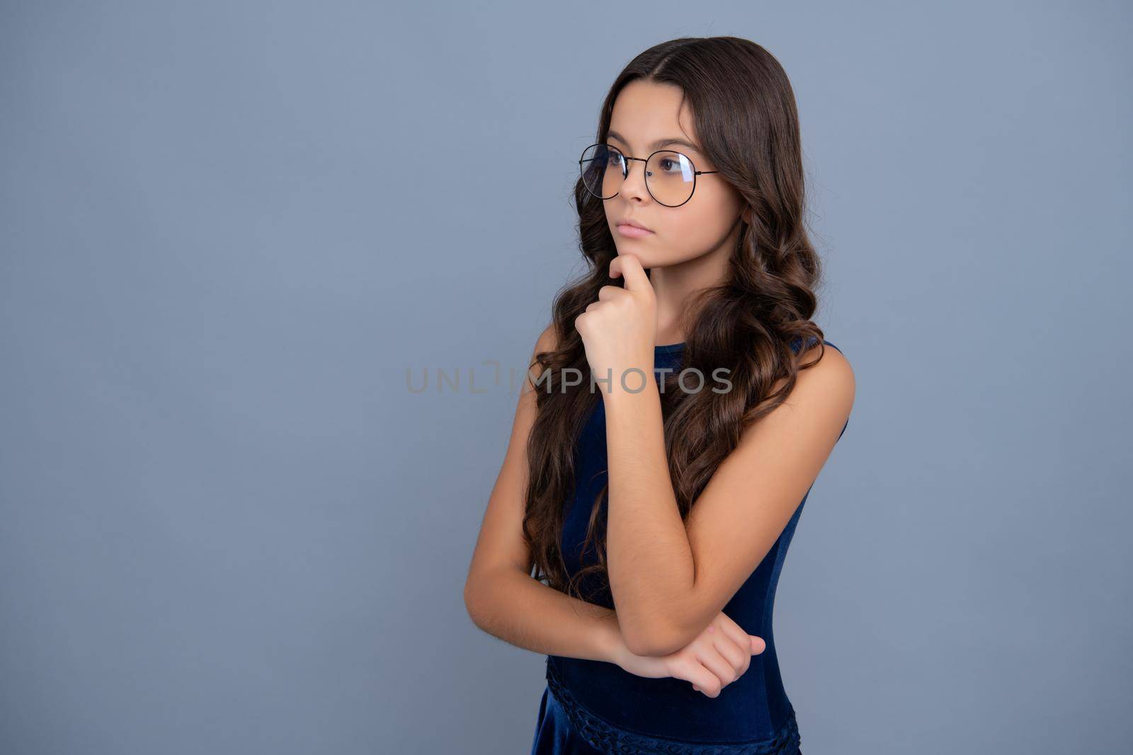 Beautiful teen girl student. Portrait of teenager school girl on isolated background. Clever schoolgirl, nerd smart child. by RedFoxStudio