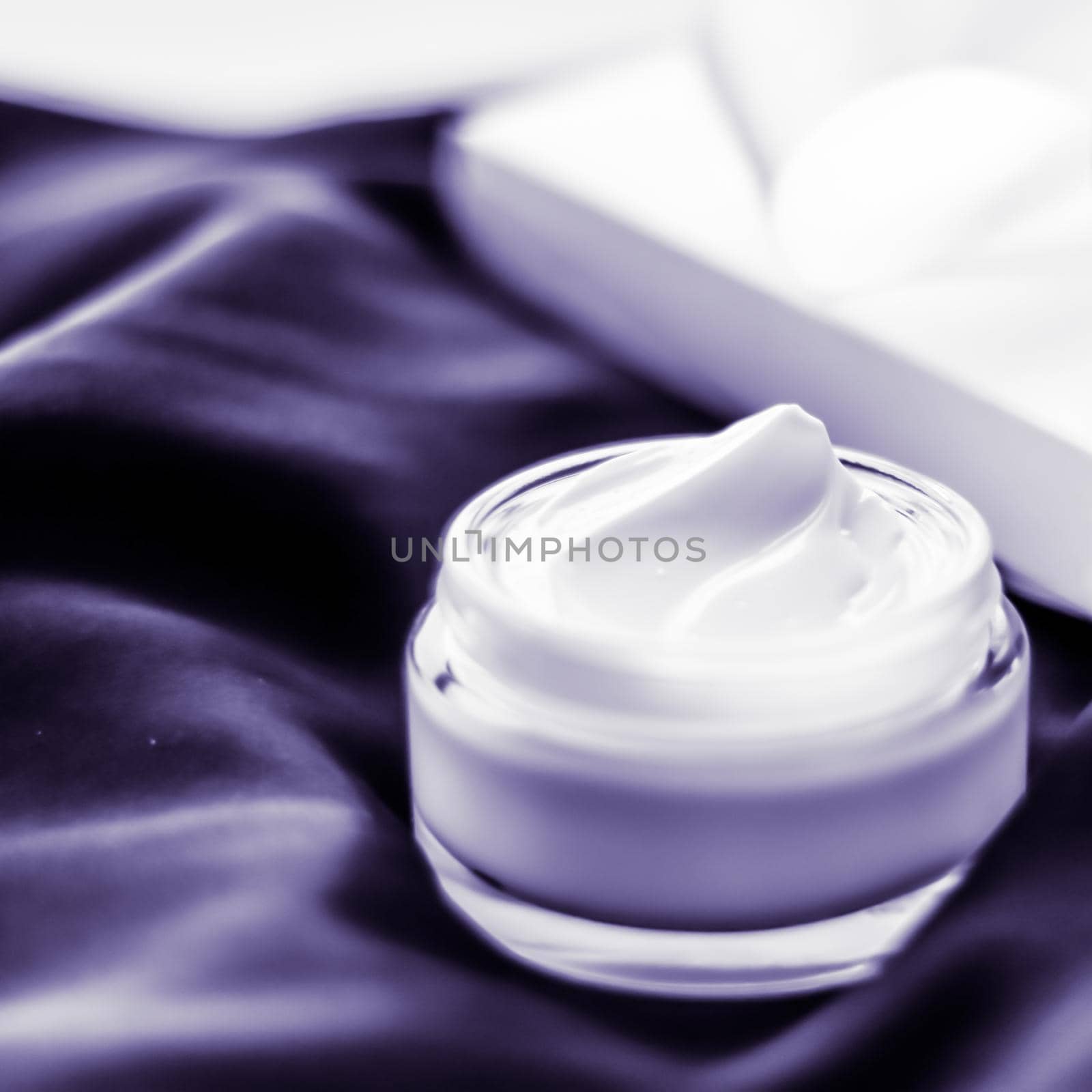 Luxury moisturizing face cream with lavender scent on violet silk, skincare beauty by Anneleven