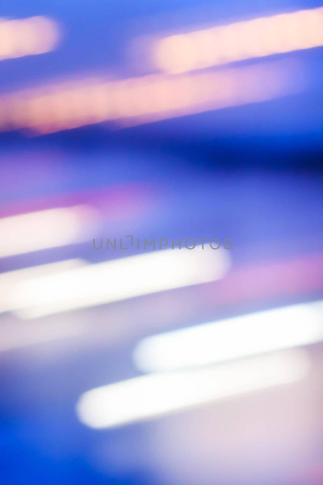 Abstract background, defocused textures and modern design concept - Evening city lights in motion