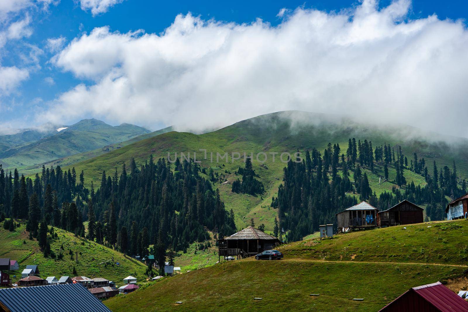 Famous georgian mountain resort Bakhmaro in summer view with old buildings