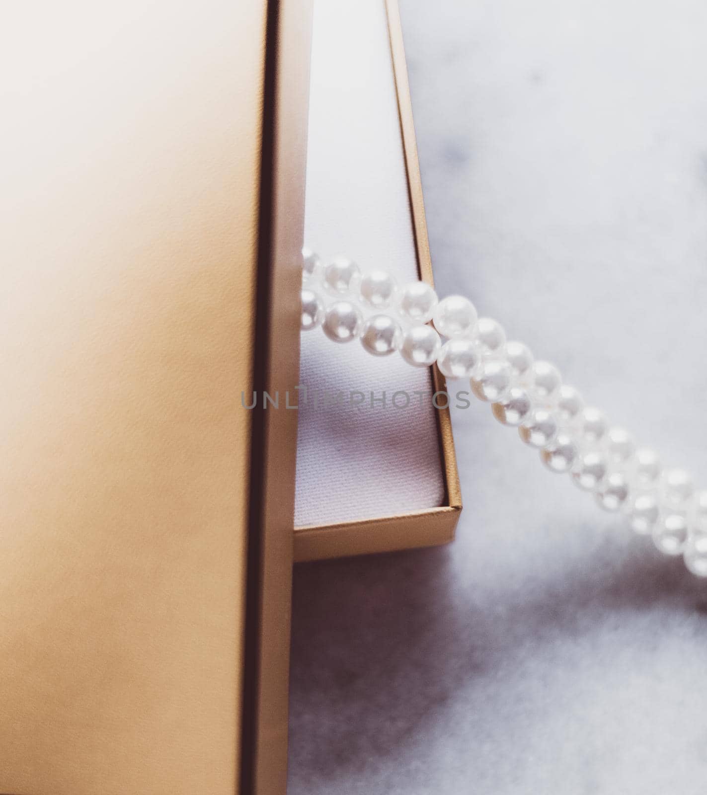 Valentine's day ideas, luxury shopping and holiday inspiration concept - Pearl jewellery in a vintage golden gift box