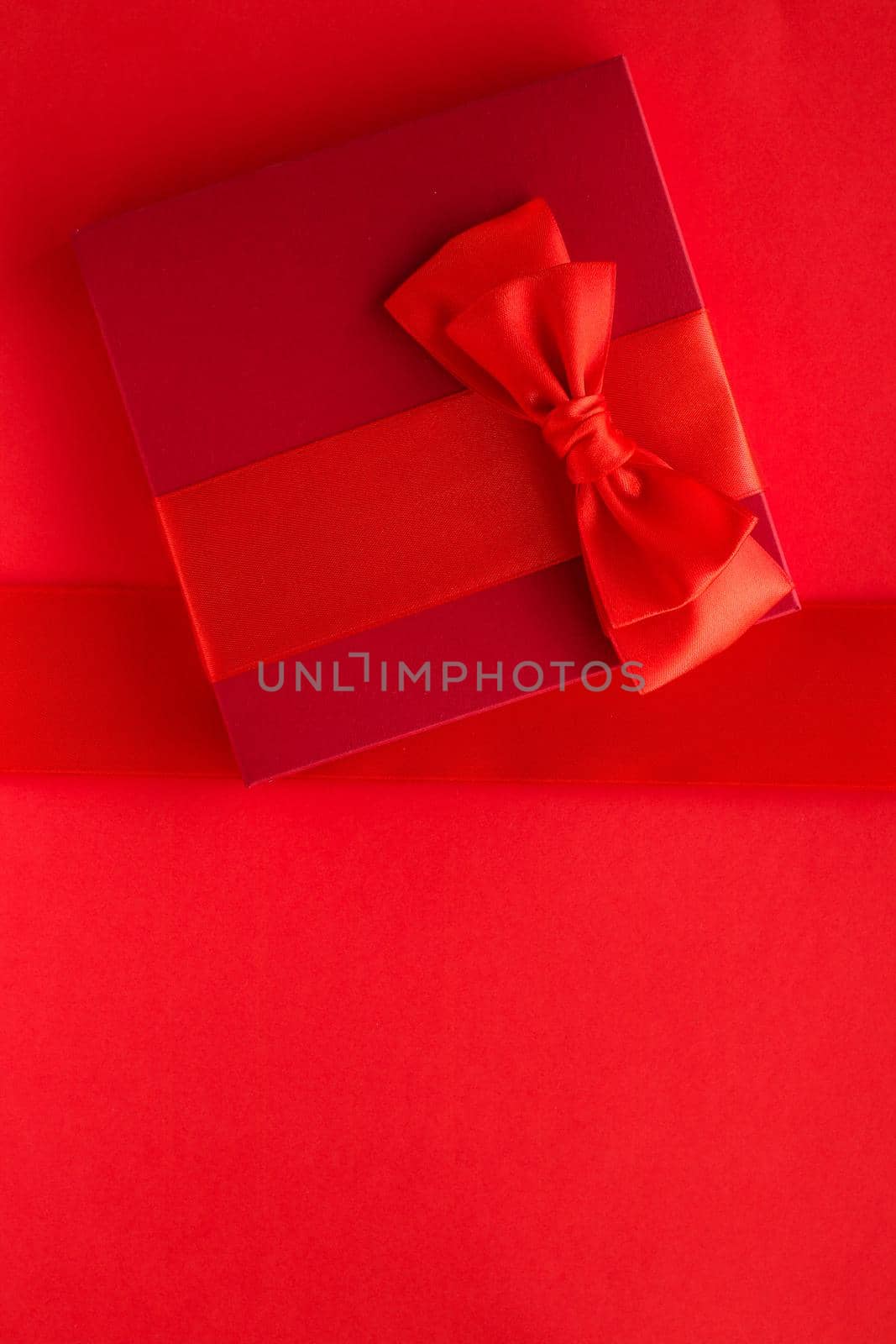 Luxury holiday gifts on red by Anneleven