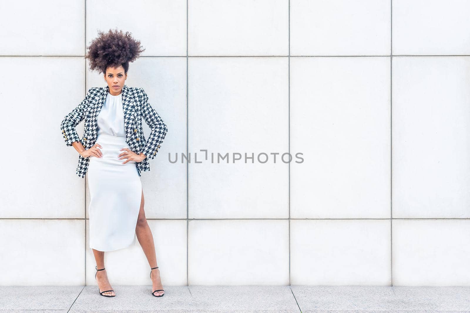 african woman dress in formal clothes modeling staring at the camera, close up view