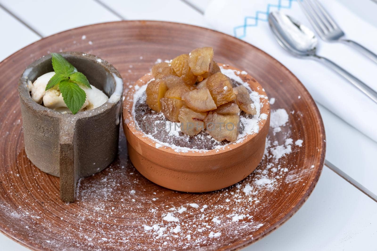 Souffle with chestnut in a casserole and ice cream with cream by Sonat