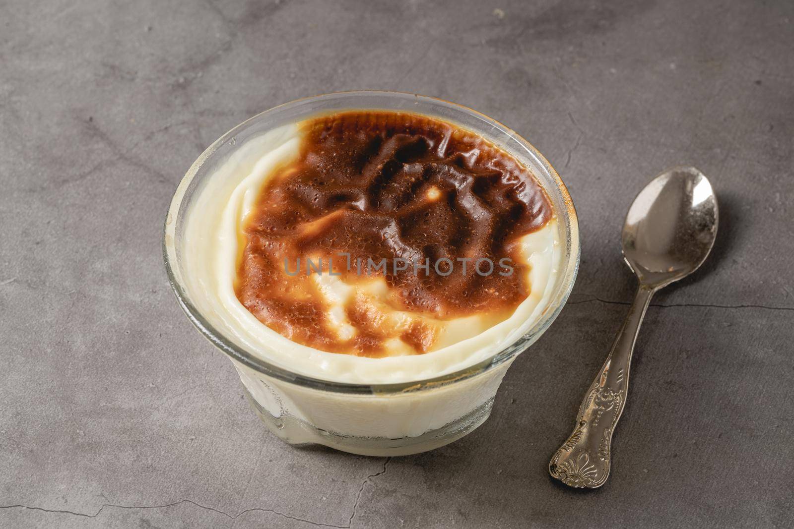 Traditional turkish dessert bakery rice pudding Turkish name Fırın Sutlac in glass bowl