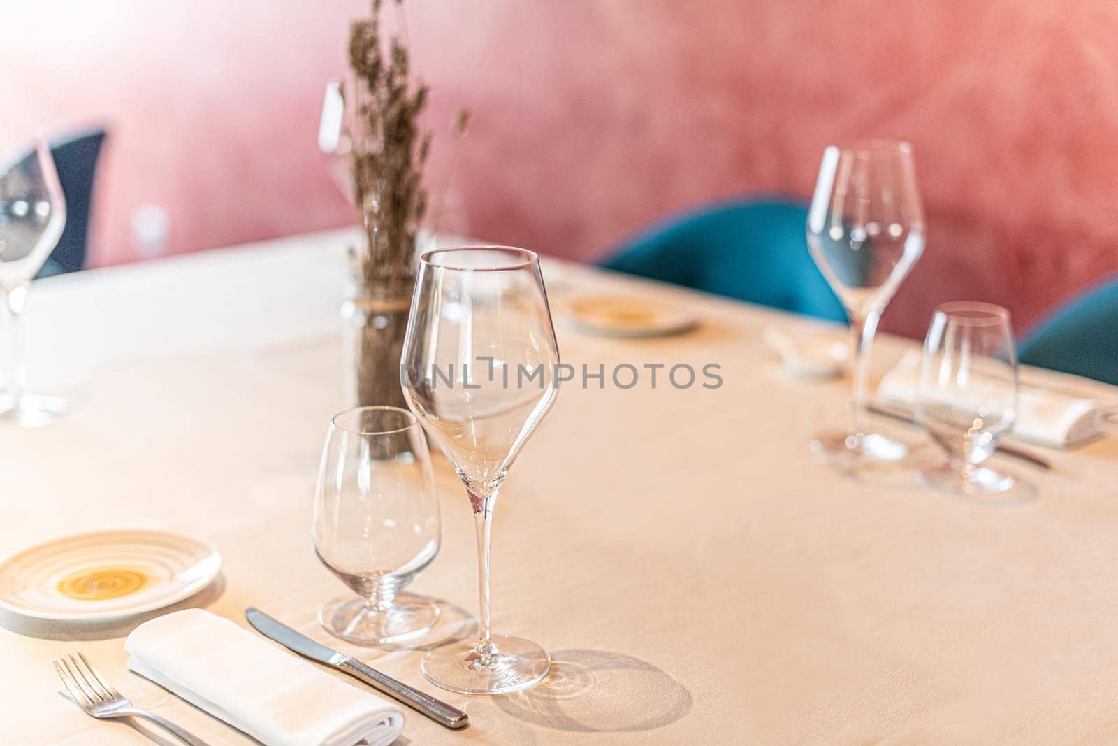 Various glasses and cutlery ready to use in a hotel. by ivanmoreno