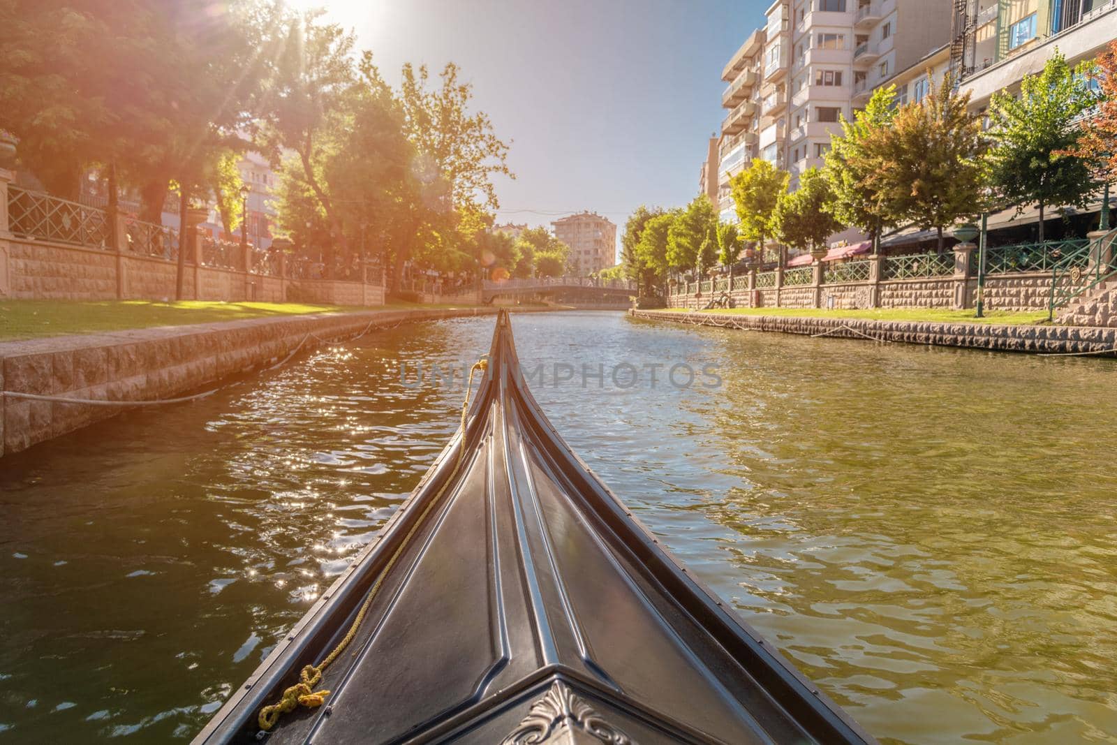 Porsuk creek and touristic gondola passing through Eskisehir city center by Sonat