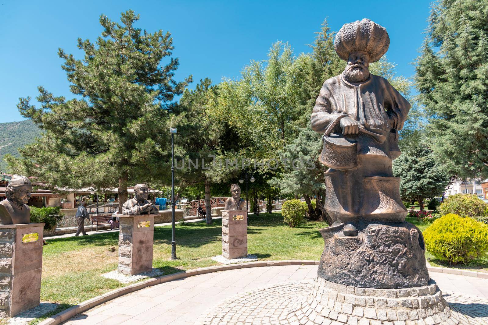 Aksehir, Turkey - July 04, 2022: The modern monument of the national hero Hoca Nasreddin and Aksehir city square by Sonat