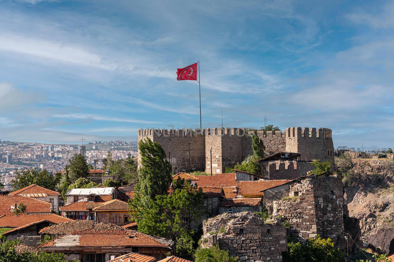 Ankara Castle with the Turkish flag flying over it. Turkish name is Ankara Kalesi