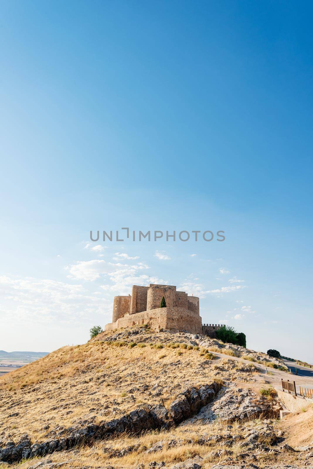 Vertical image with copy space of a medieval fortified castle in Consuegra, Toledo, Spain