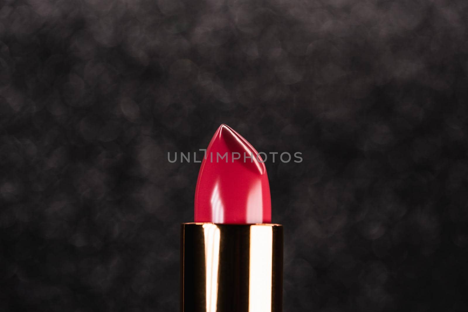 Red lipstick on black dark background. Showcase or advertisement for beauty brand, Concept of fashion, cosmetics by kristina_kokhanova