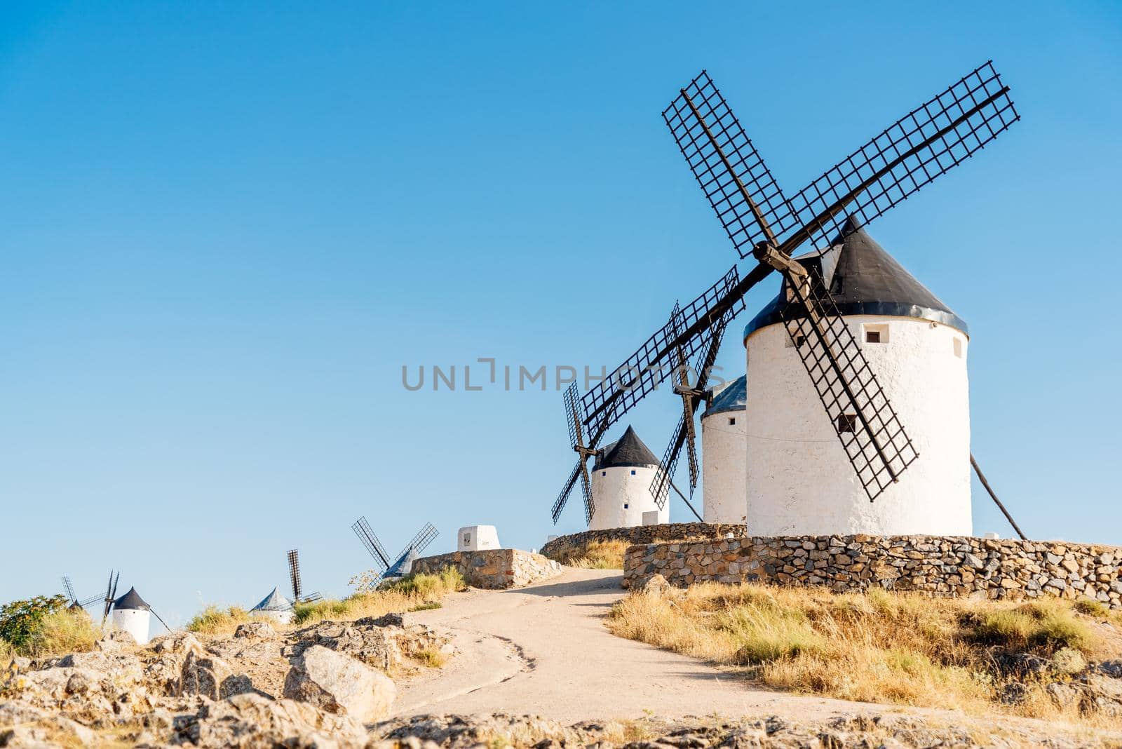 Historic windmills restored on a hillside in Consuegra, Toledo in Spain
