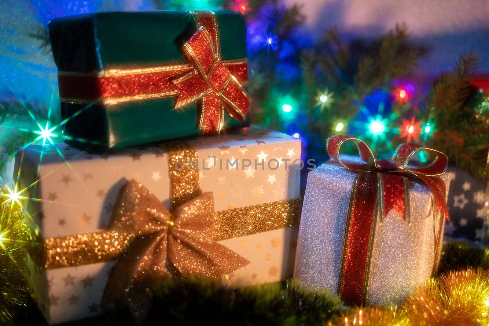 Christmas background with gift boxes. Presents with ribbons and bows, holidays concept. High quality photo