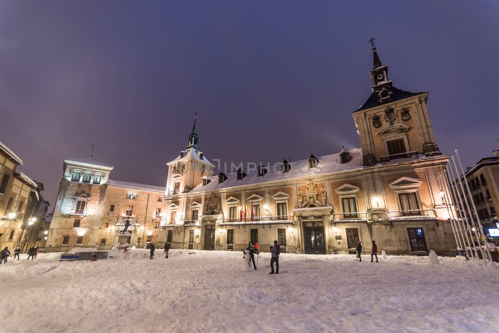 Plaza de la Villa in Madrid on a winter night after a heavy snowfall.