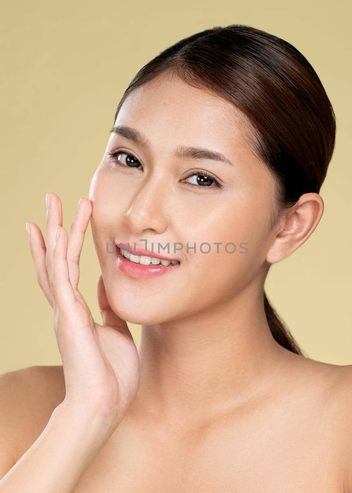 Closeup ardent young woman posing beauty gesture with clean fresh skin. by biancoblue