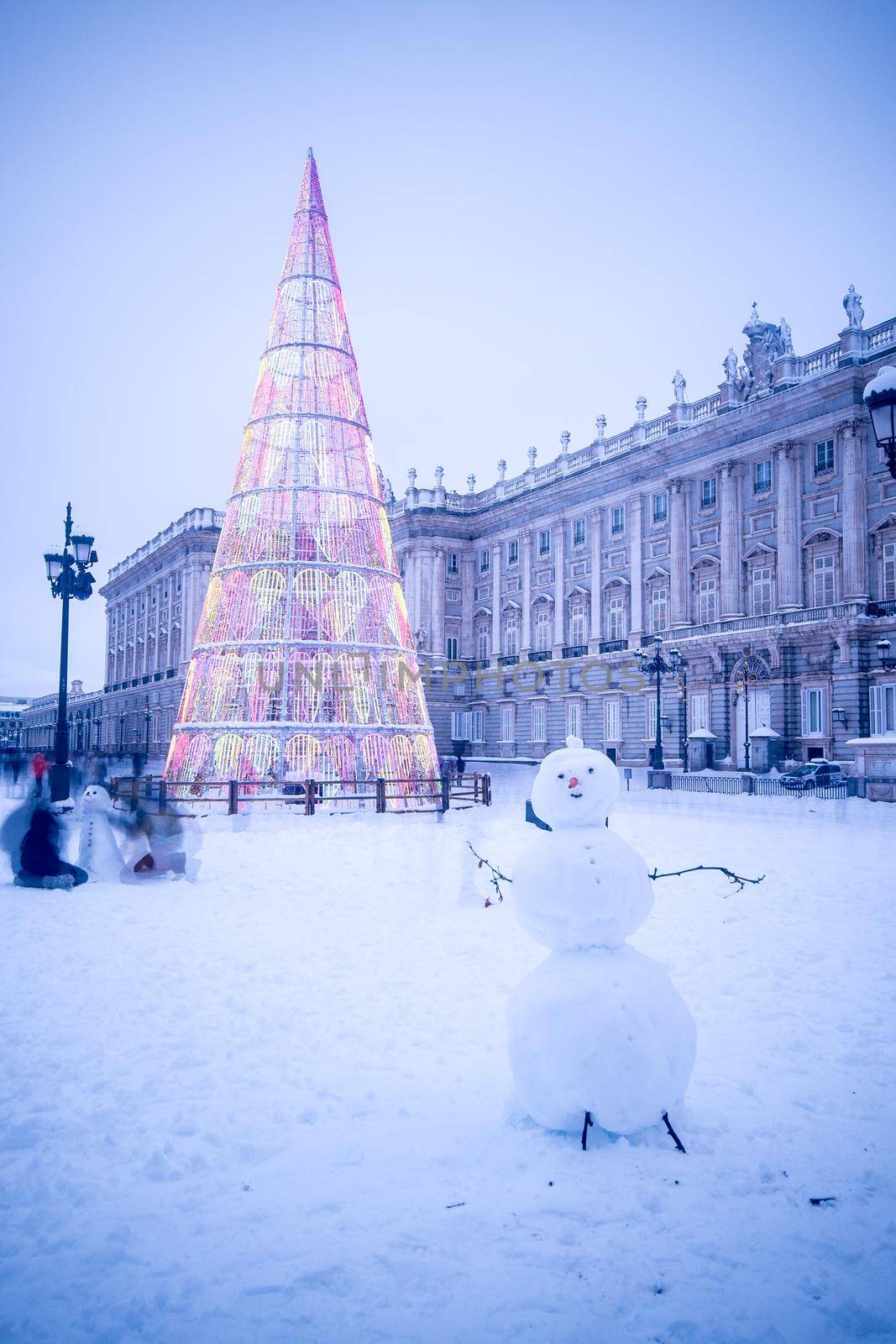 Royal Palace of Madrid on a cold winter day, after a heavy snowfall.