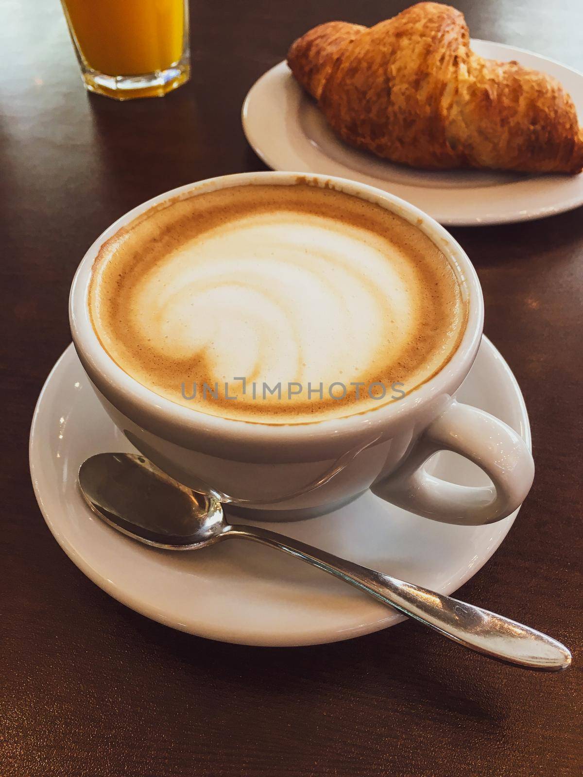 Breakfast, food and drinks and service concept - Cappuccino in a restaurant, at a coffee break