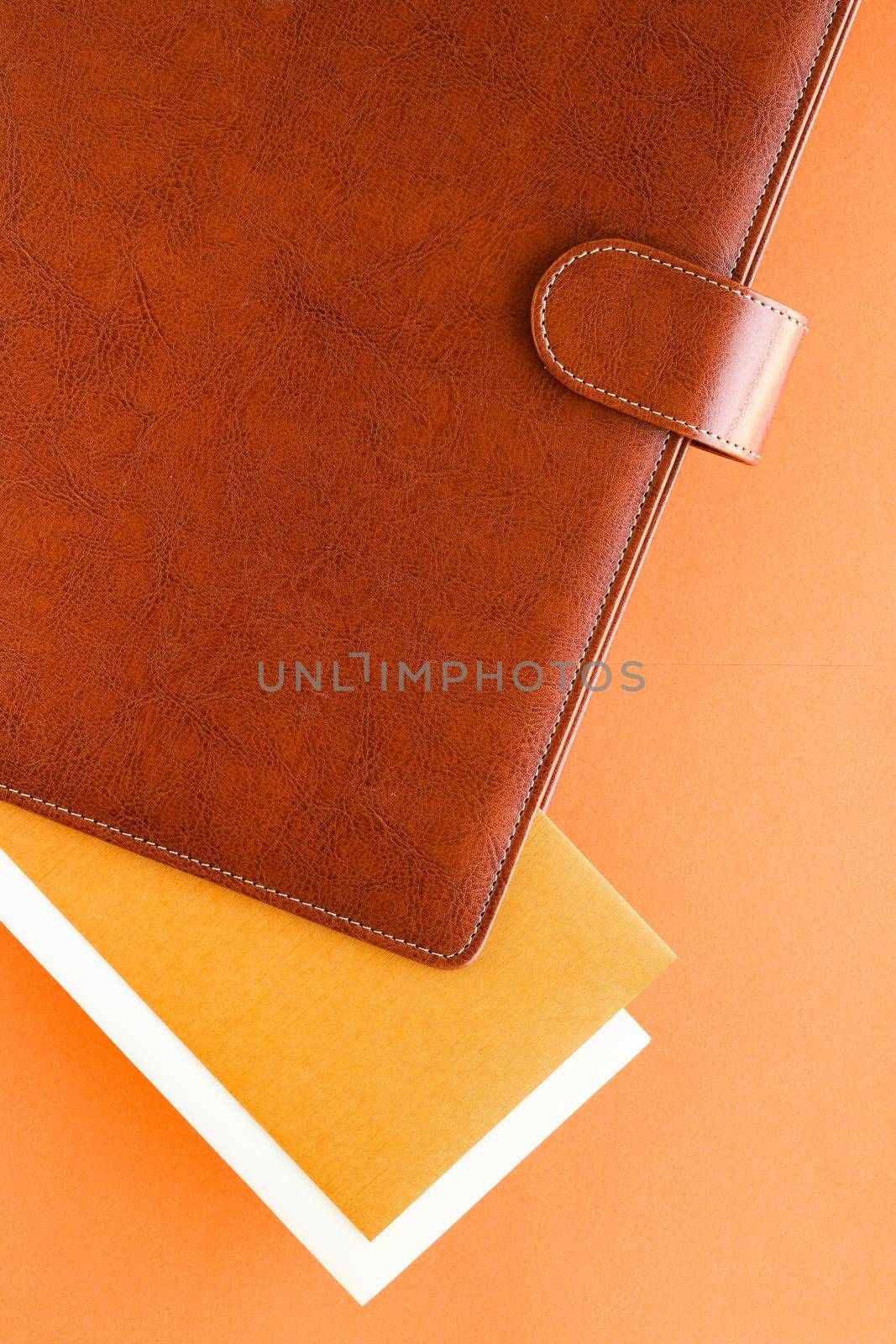 Modern workspace, productivity and corporate lifestyle concept - Luxury business brown brief-case on the office table desk, flatlay