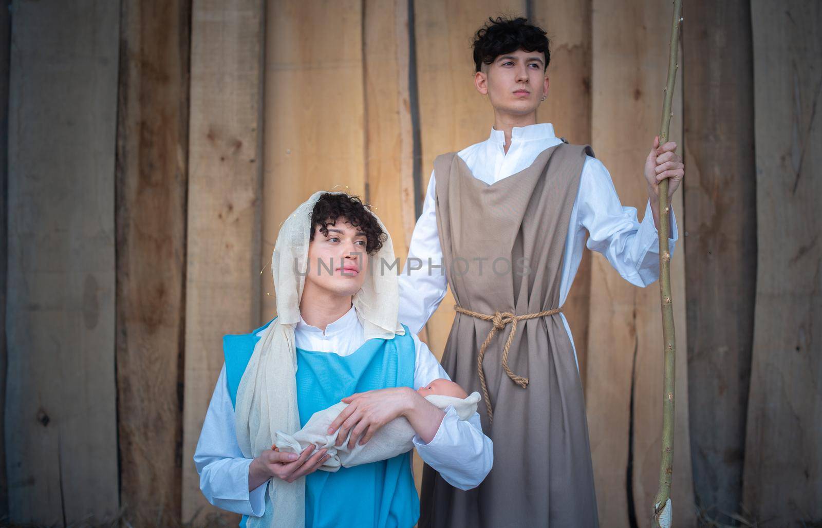 Nativity scene represented by androgynous people looking straight ahead