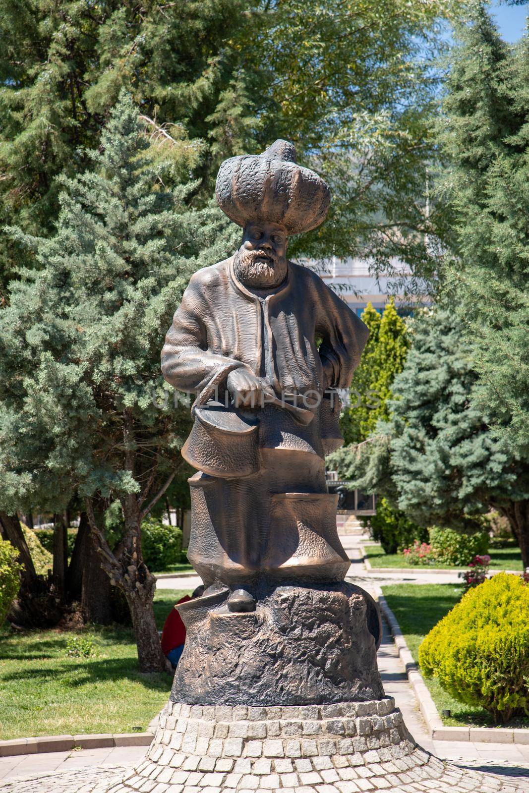 Aksehir, Turkey - July 04, 2022: The modern monument of the national hero Hoca Nasreddin and Aksehir city square by Sonat