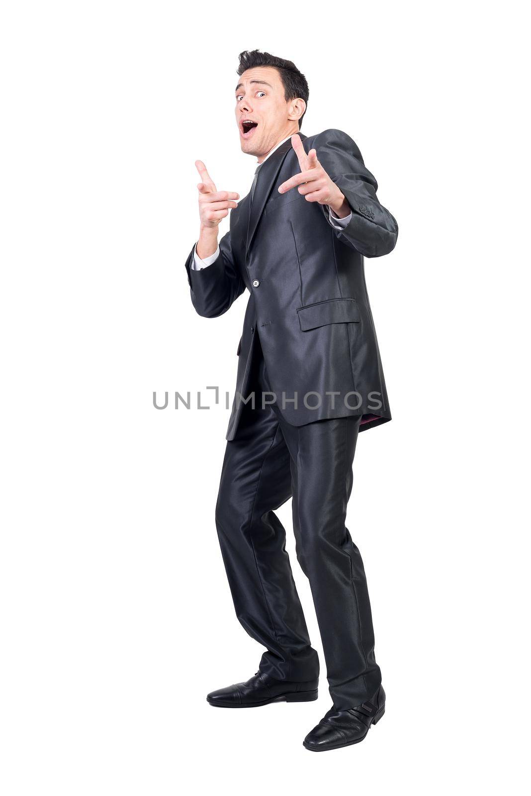 Full body of handsome male entrepreneur showing you gesture and pointing at camera on white background in studio