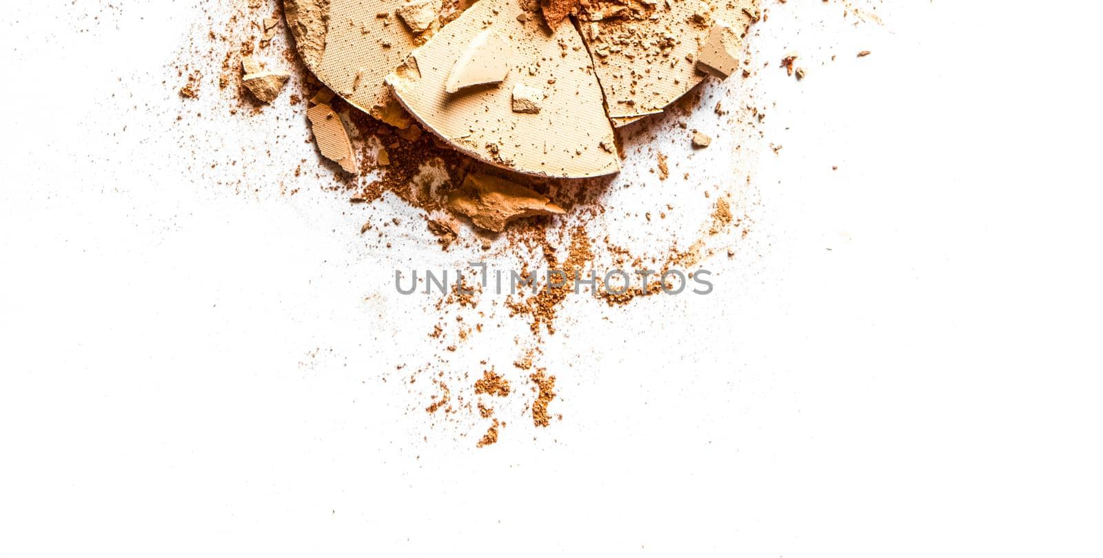 Beauty texture, cosmetic product and art of make-up concept - Crushed eyeshadows and powder isolated on white background