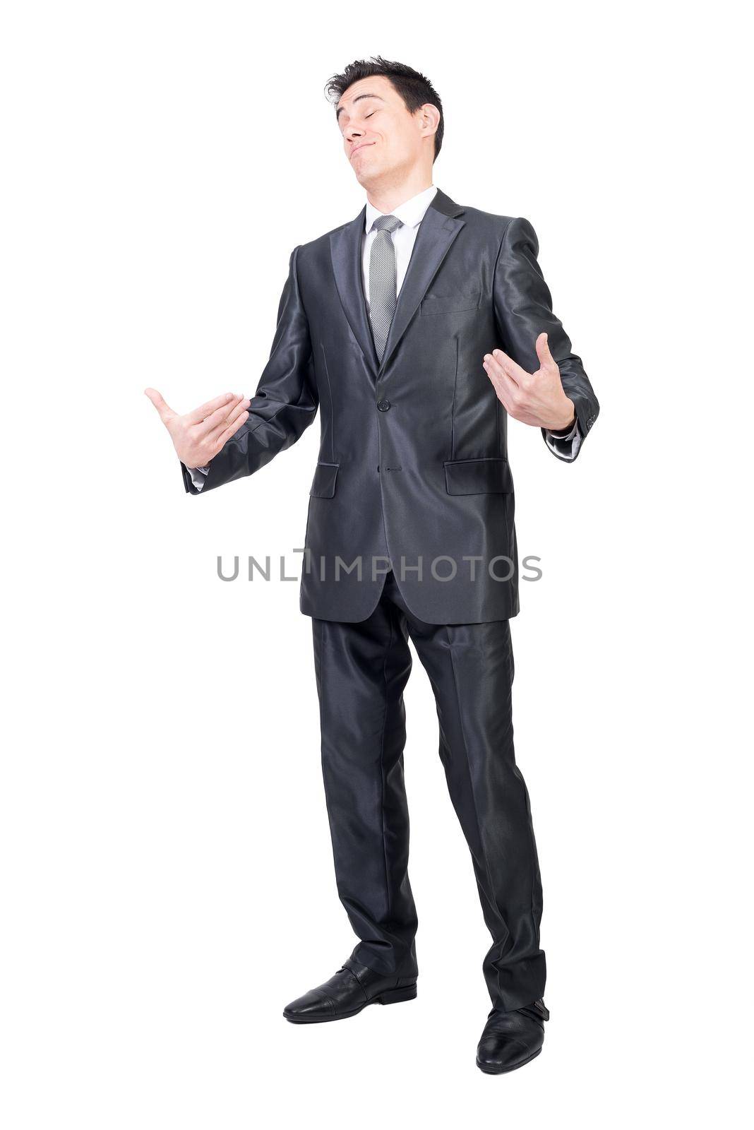 Full body of self confident male in elegant suit pointing at himself with closed eyes while standing isolated on white background in studio