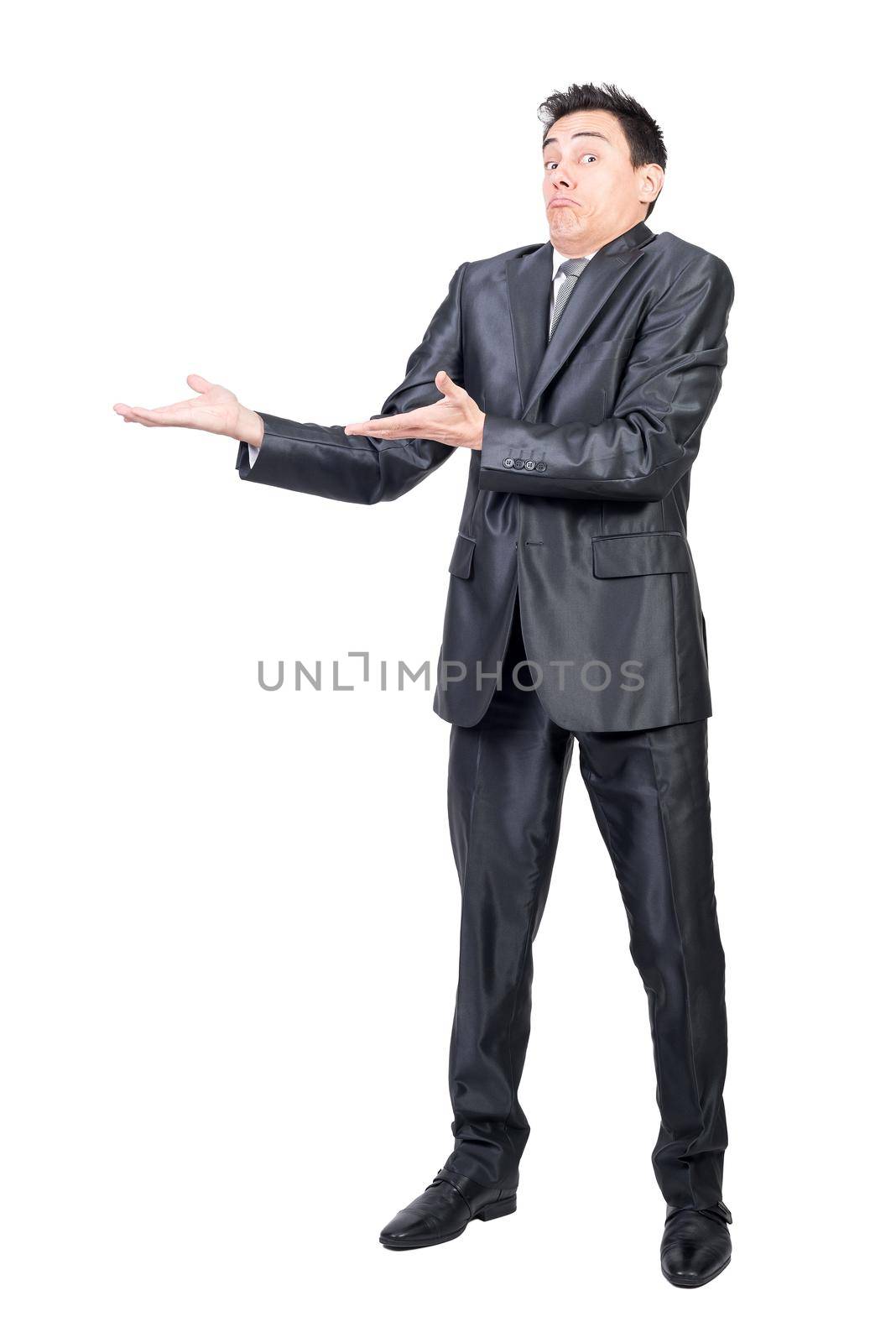 Full body of amazed male in formal suit pointing aside with hands while promoting ad isolated on white background in studio