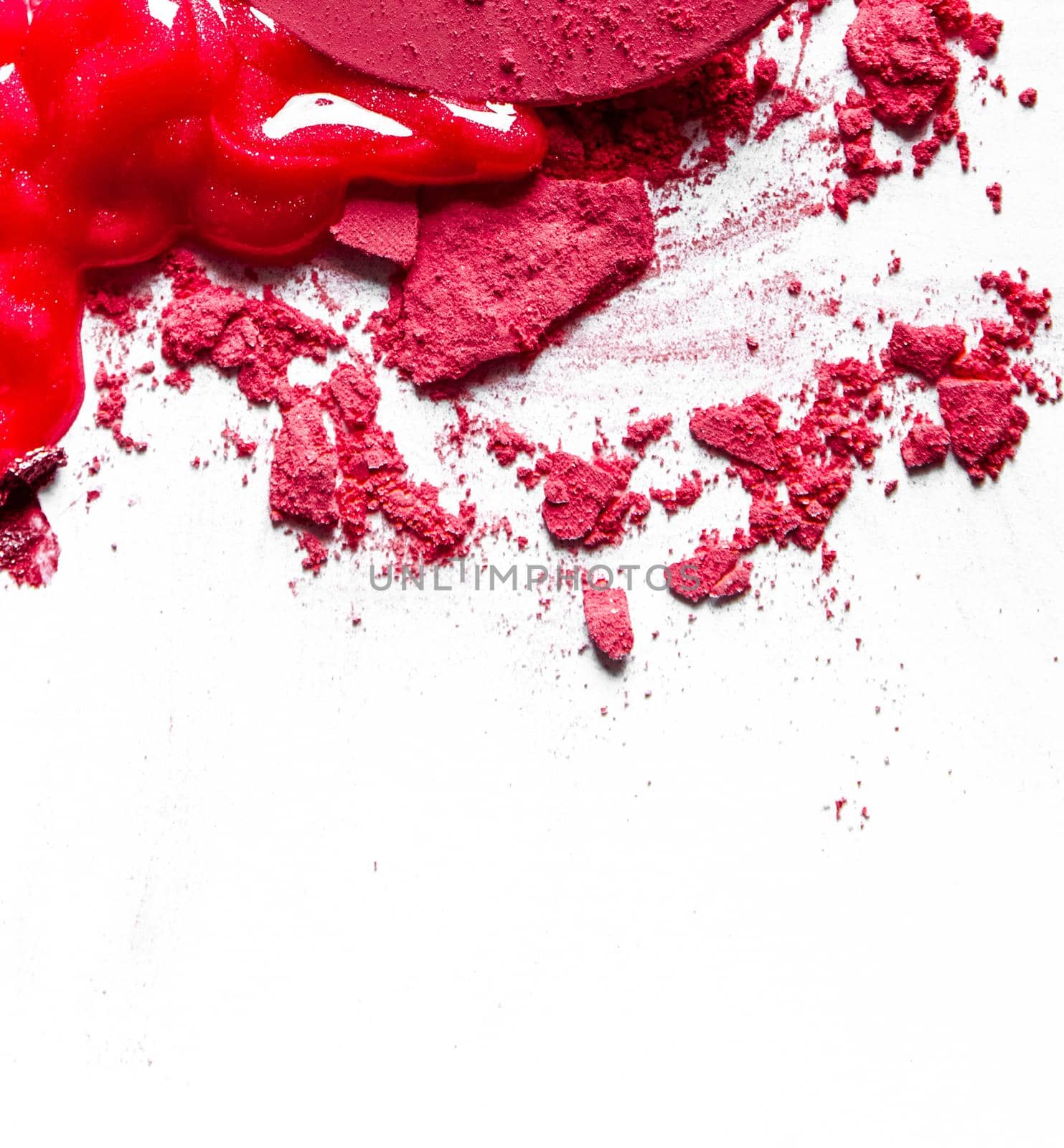 Beauty texture, cosmetic product and art of make-up concept - Crushed eyeshadows, lipstick and powder isolated on white background