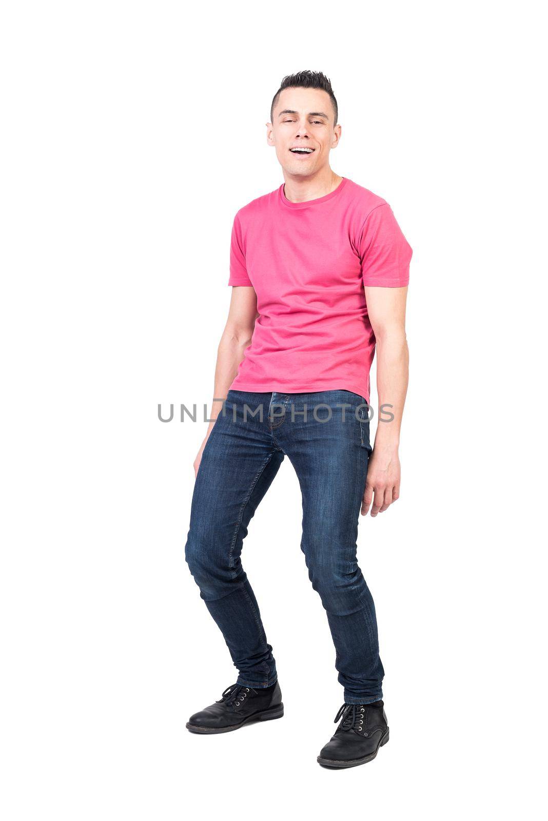 Full body of positive male model feeling relieved exhaling with opened mouth on white background