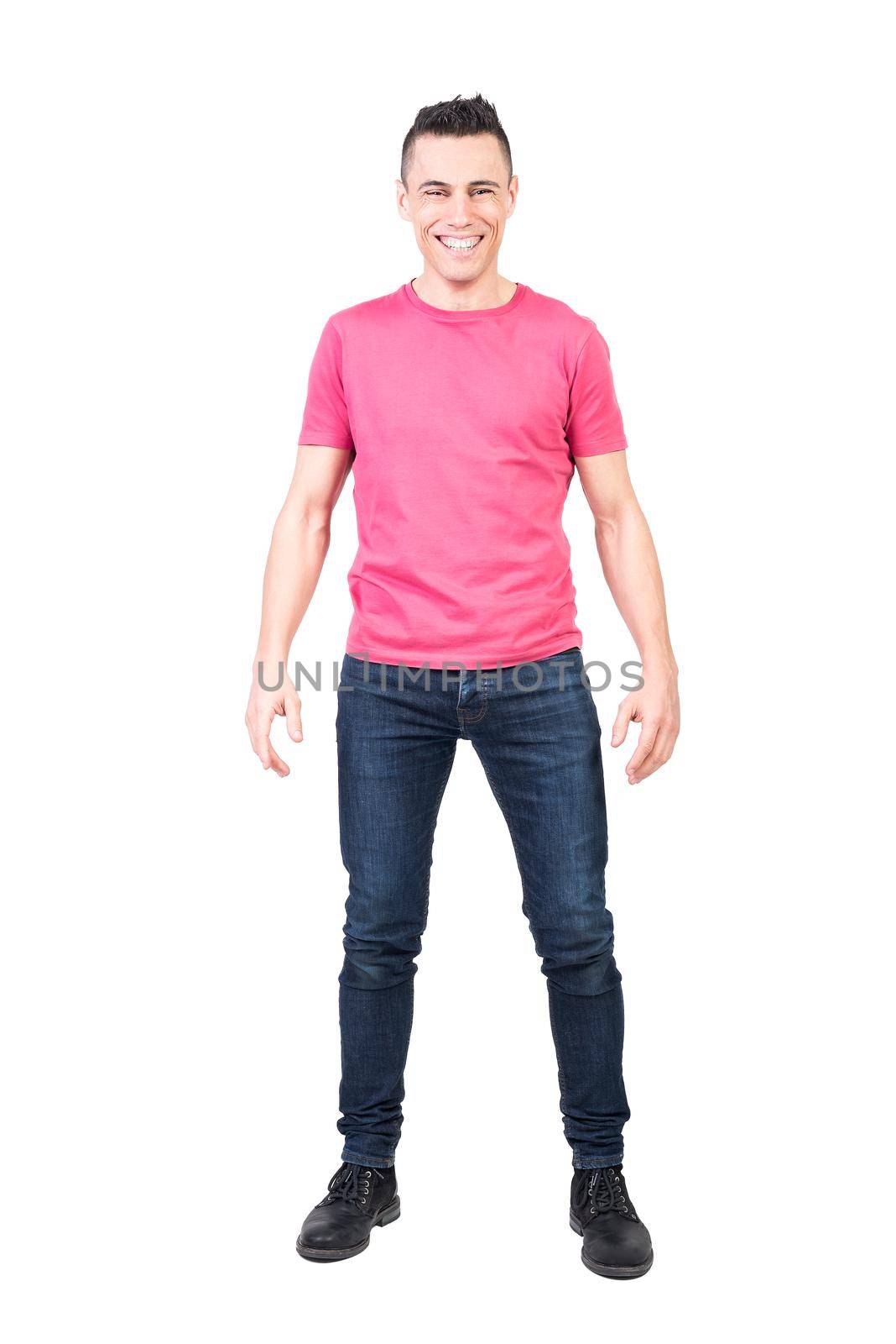 Full body of positive male model laughing happily and looking at camera against white background