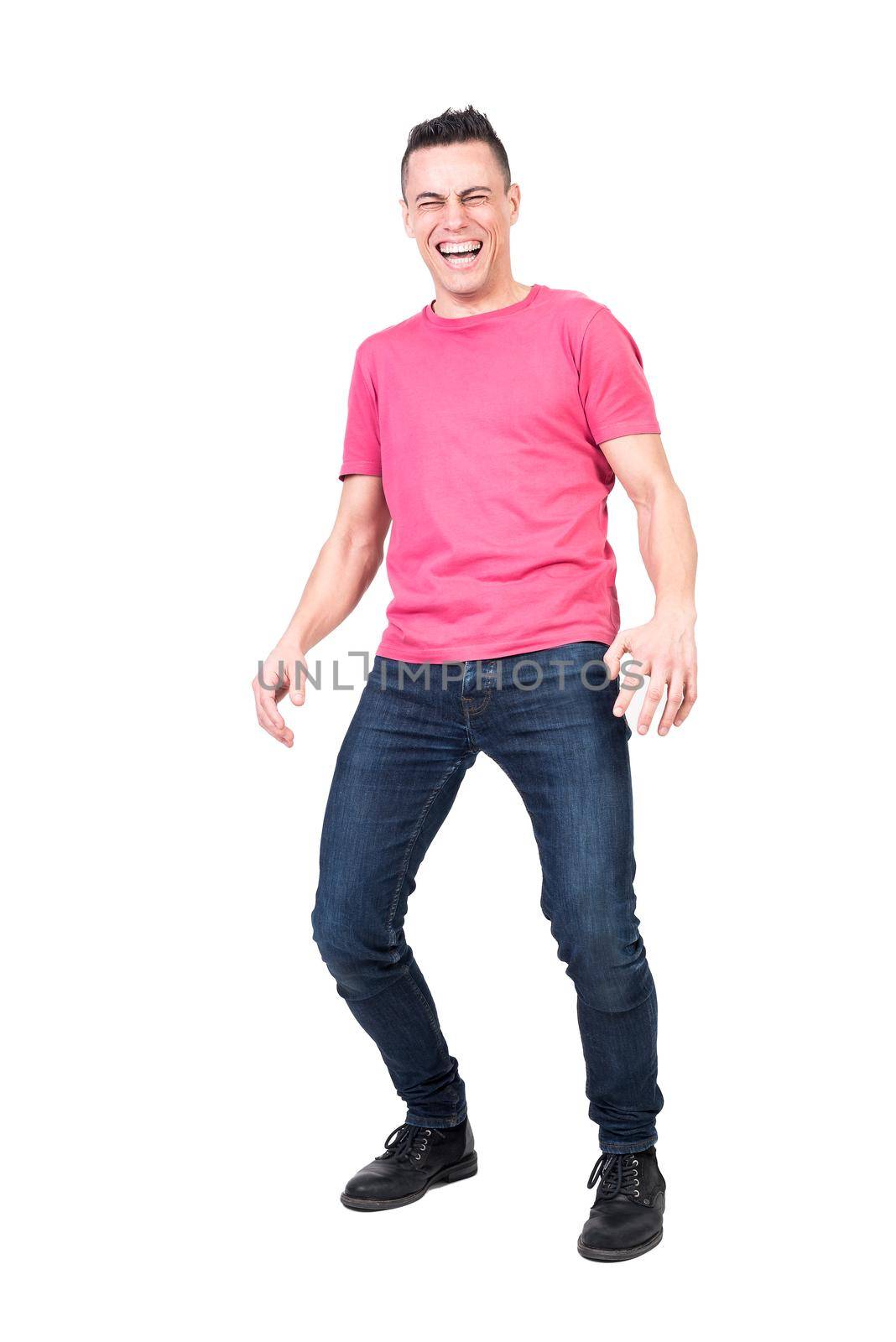 Full body of joyful male model laughing on joke with closed eyes on white background