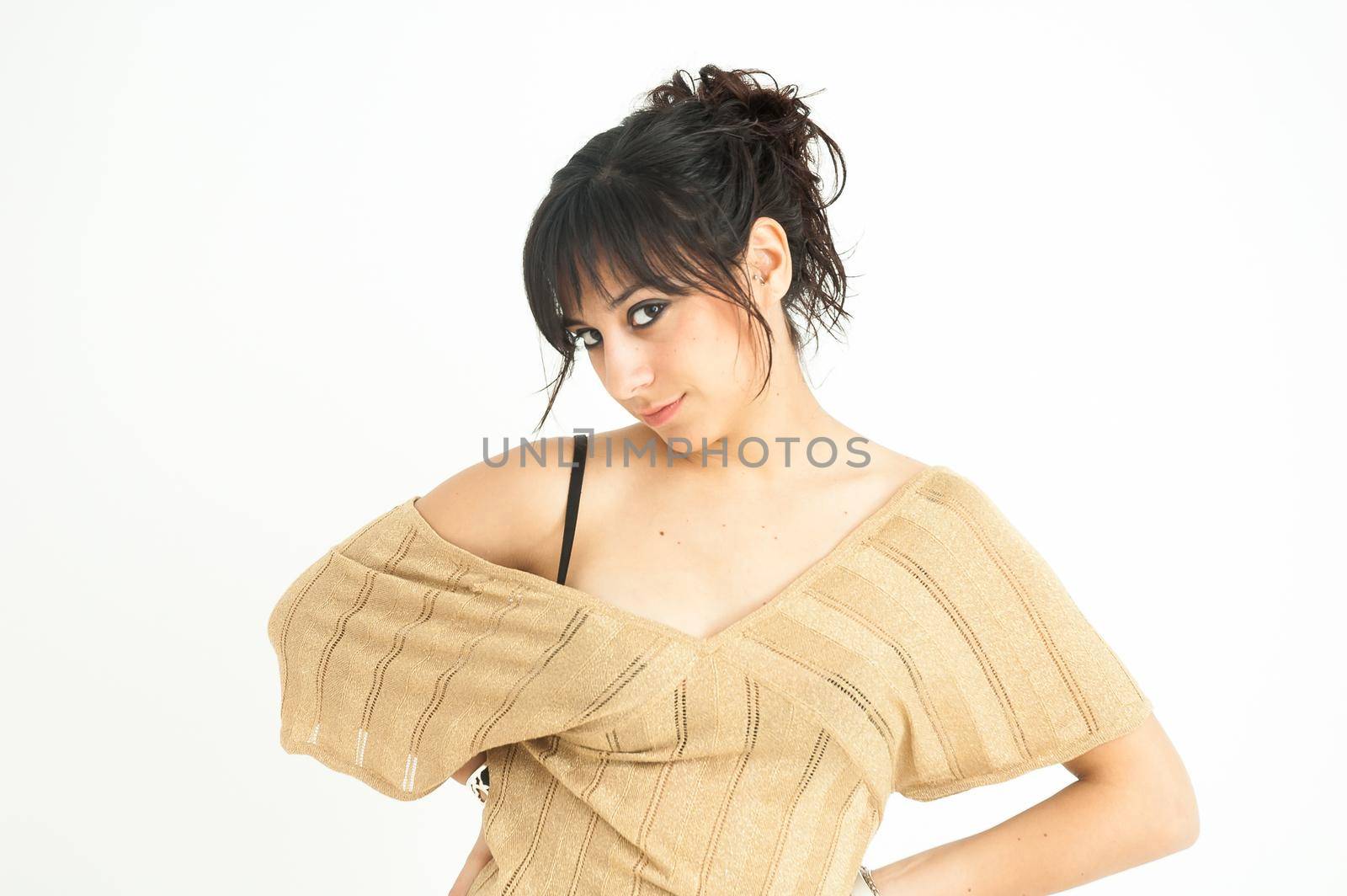 pretty girl staring at camera and smiling, with collected hair, on white background, medium shot