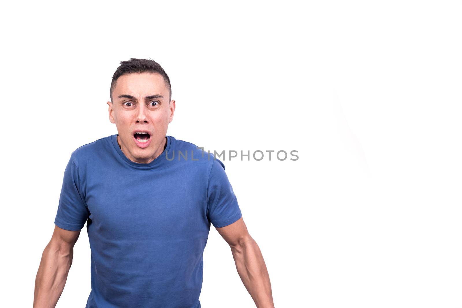 Studio portrait with white background of a man opening the mouth with expression of fear