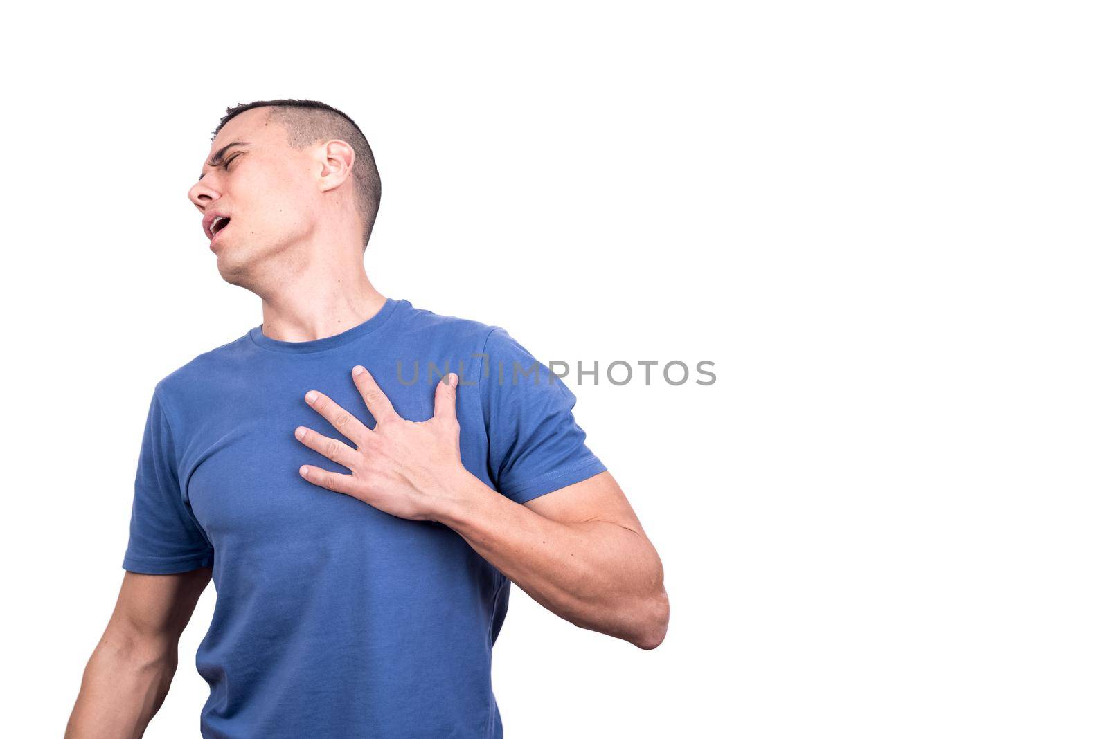 Studio portrait with white background of a wounded man with his hand on his heart