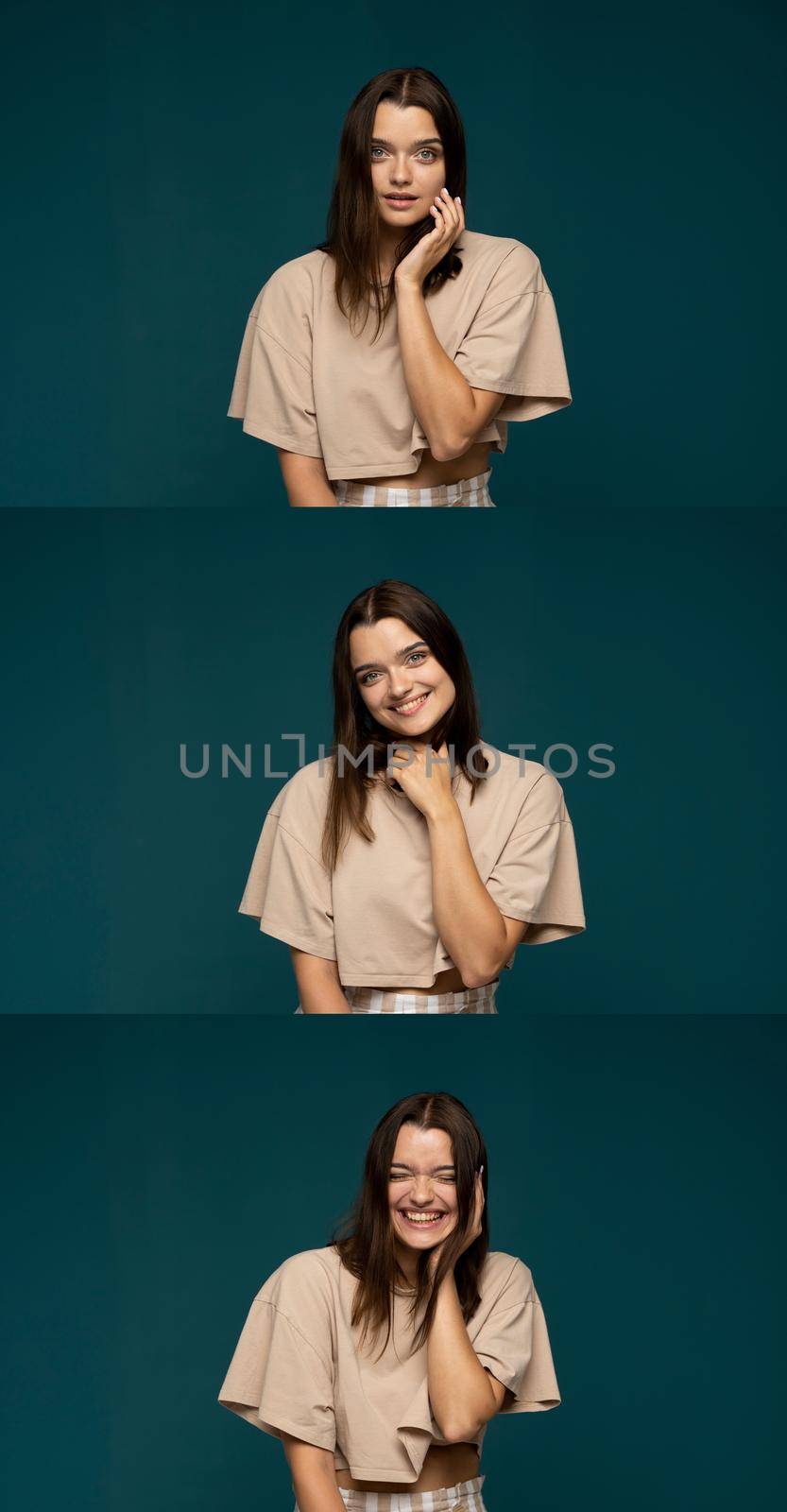 Vertical collage of happy emotions. Set of three portraits with positive emotions of young brunette girl in beige oversized t-shirt on cyan background