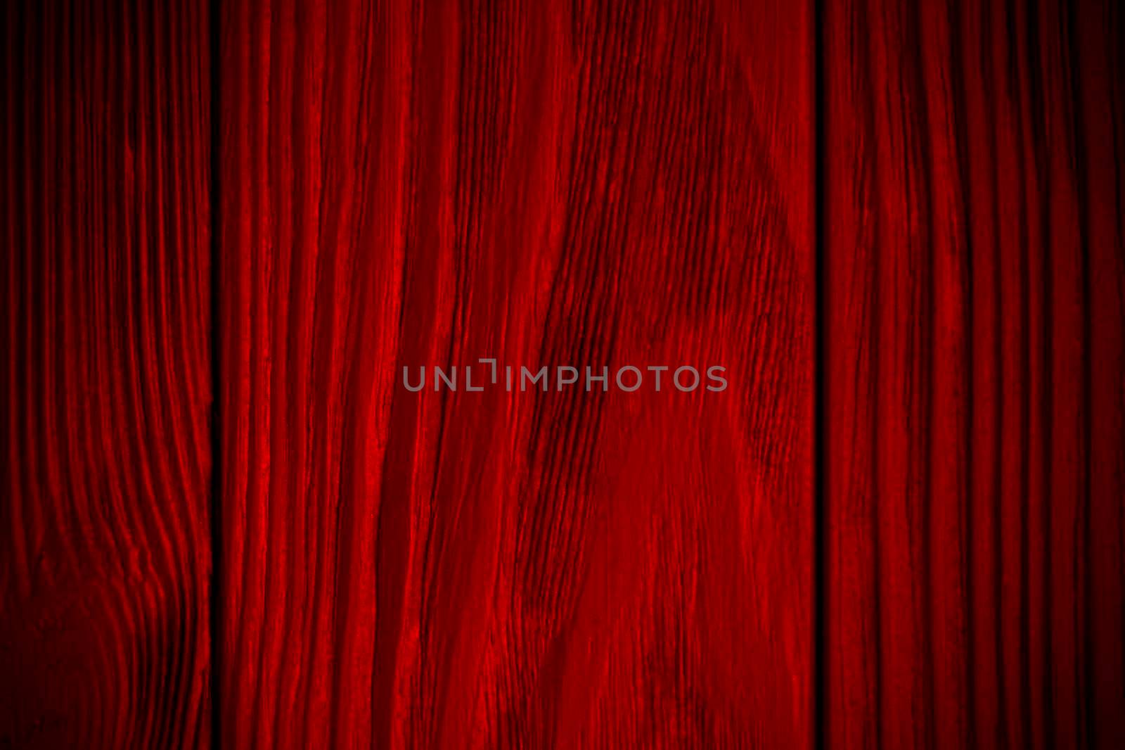 red textured wooden background with black. Vignette. Vintage bright background. Wood texture. High quality photo