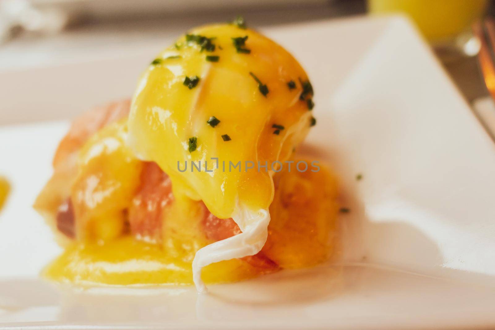 Poached egg with salmon for brunch in a luxury restaurant by Anneleven