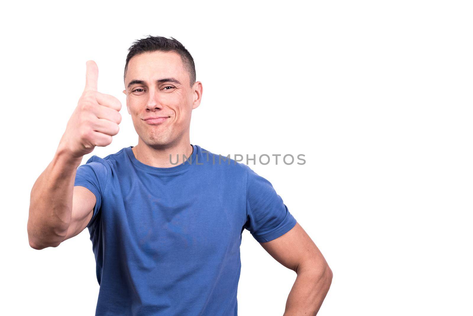 Studio portrait with white background of a man gesturing to be okay with the thumb while smiling