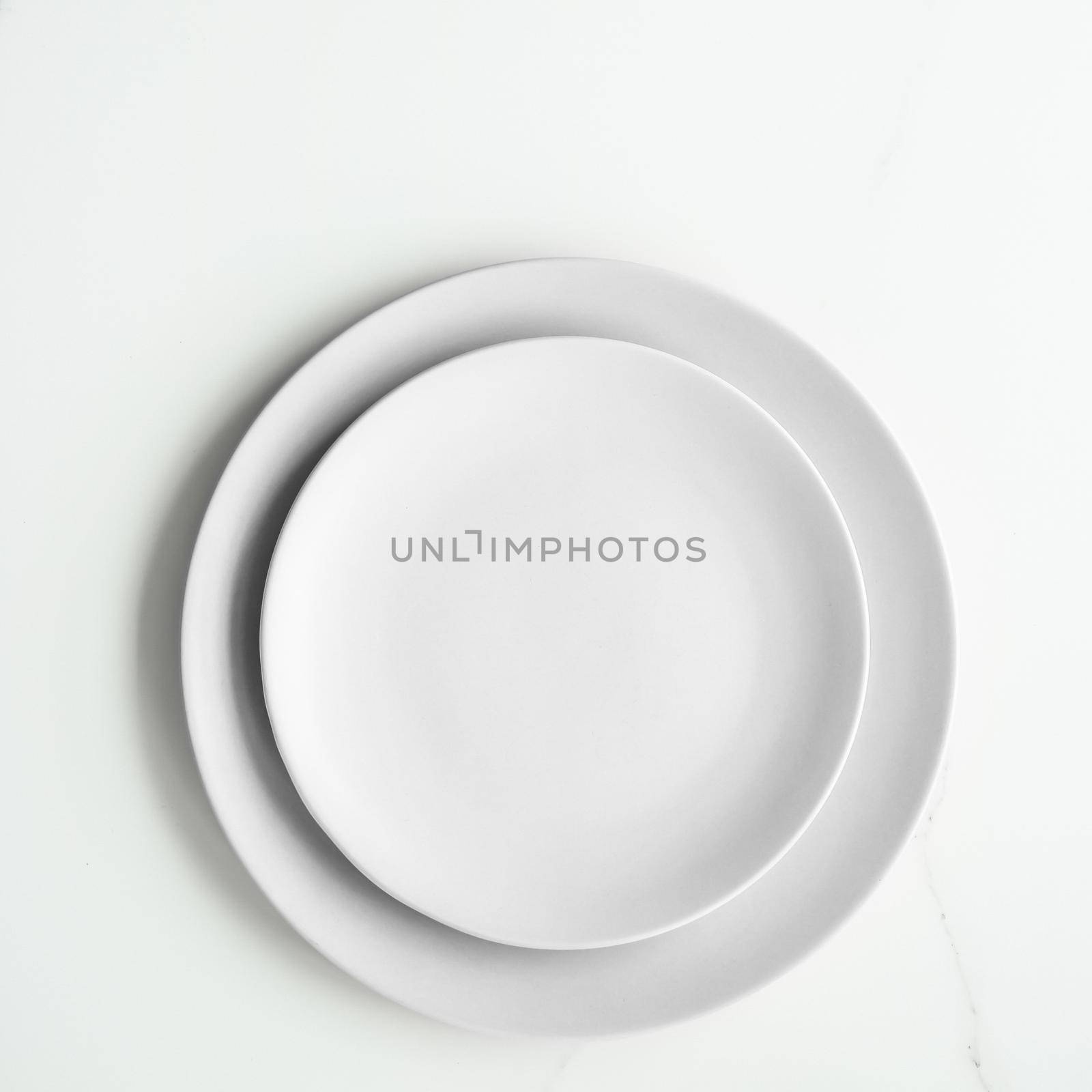 White empty plate on marble, flatlay - stylish tableware, romantic table decor and food menu concept. Serve the perfect dish