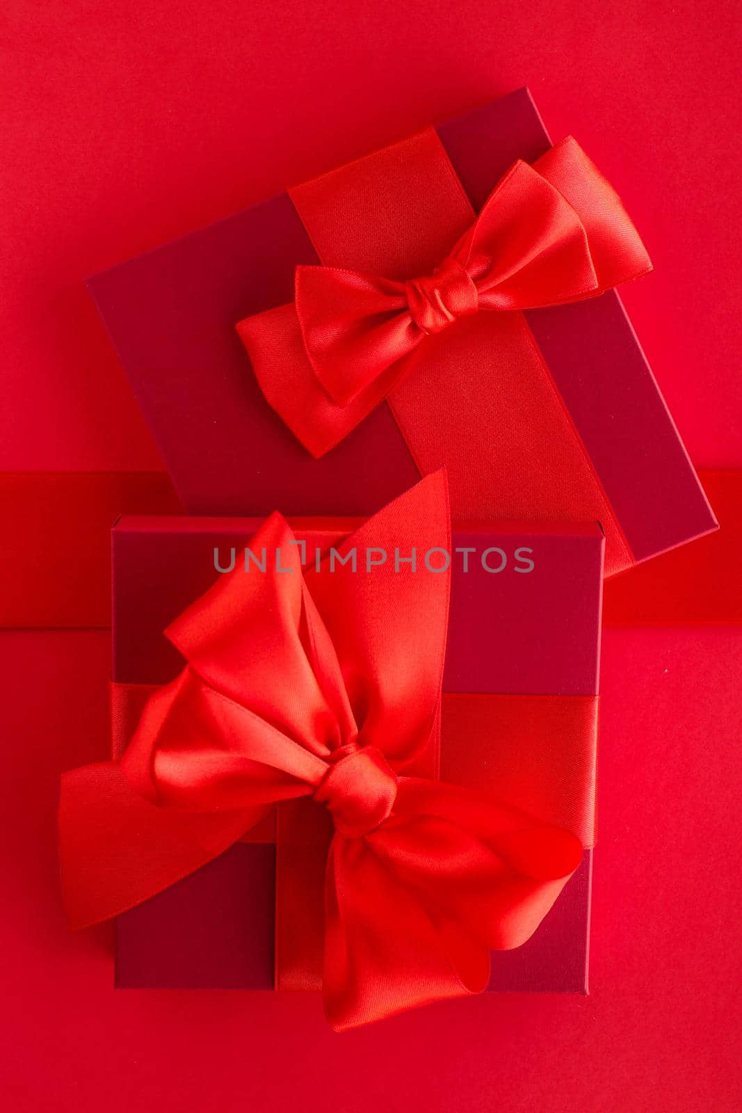 Luxury holiday gifts on red by Anneleven